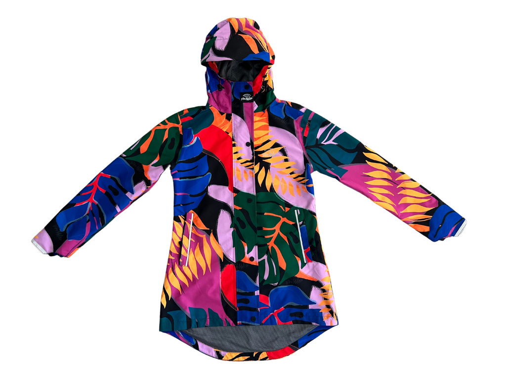 Scribbler rainwear, waterproof raincoat for women, rain jacket for ladies, outerwear, waterproof, mesh lined, lightweight, recycled plastic, sustainable fashion, winter coat, tropical Carnaval print, carnival print, mesh lined, beautiful, colourful print, breathable, packable coat, NZ, New Zealand designer, plus size, curvy, curves, mustard yellow, pink, blue, green