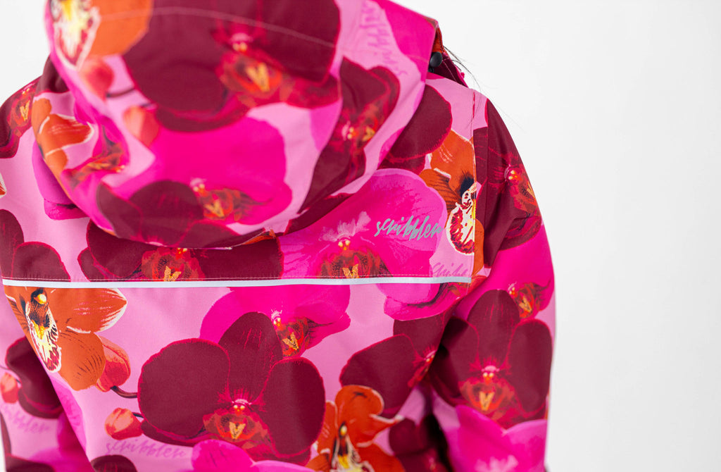 Orquidea Scribbler mesh-lined rain jacket, pink orchid floral print, raincoat, colourful printed rain wear, waterproof jacket for women, lightweight, plus size raincoat, New Zealand design, PFA free, recycled plastic fabrics.