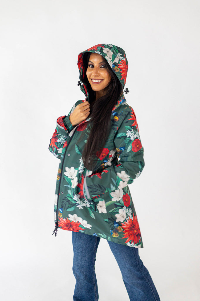 Jardin Scribbler mesh-lined rain jacket, green botanical floral print, raincoat, colourful printed hooded rain wear, waterproof jacket for women, lightweight, plus size raincoat, New Zealand design, PFA free, recycled plastic fabrics.