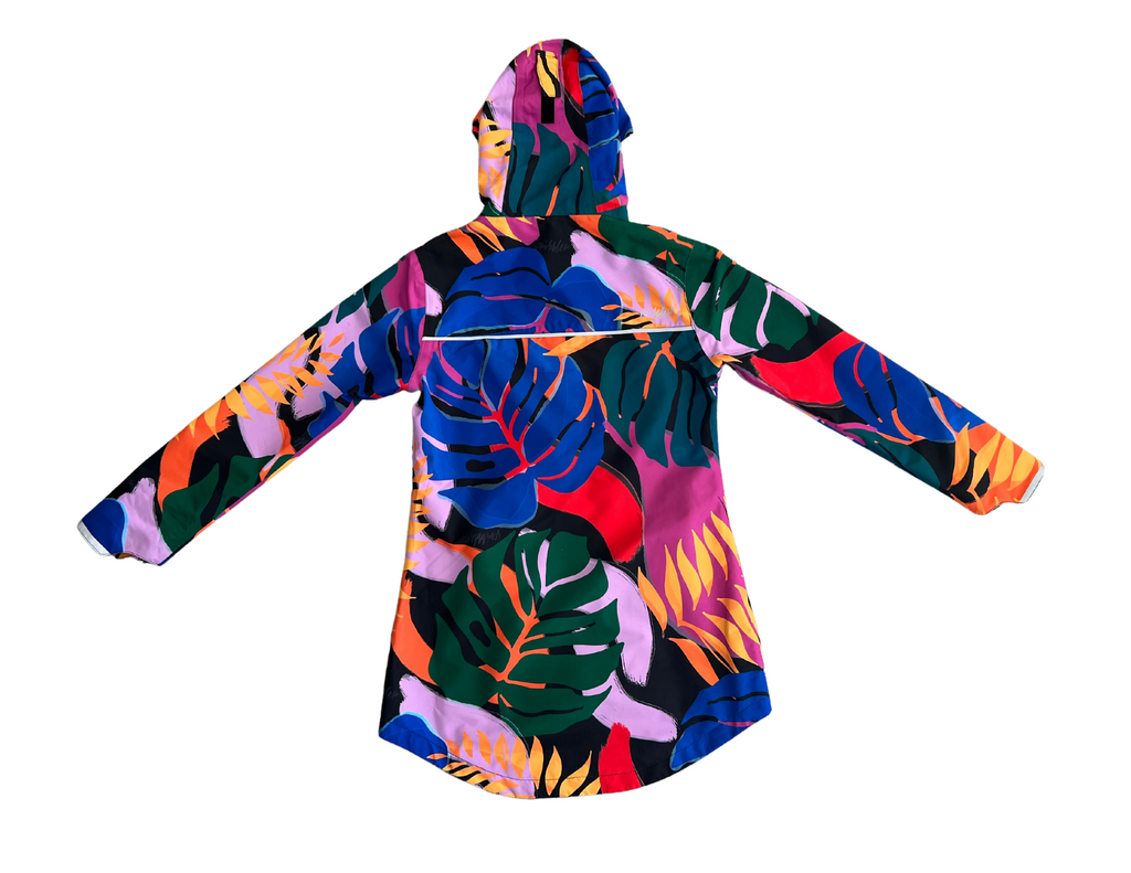 Scribbler rainwear, waterproof raincoat for women, rain jacket for ladies, outerwear, waterproof, mesh lined, lightweight, recycled plastic, sustainable fashion, winter coat, tropical Carnaval print, carnival print, mesh lined, beautiful, colourful print, breathable, packable coat, NZ, New Zealand designer, plus size, curvy, curves, mustard yellow, pink, blue, green