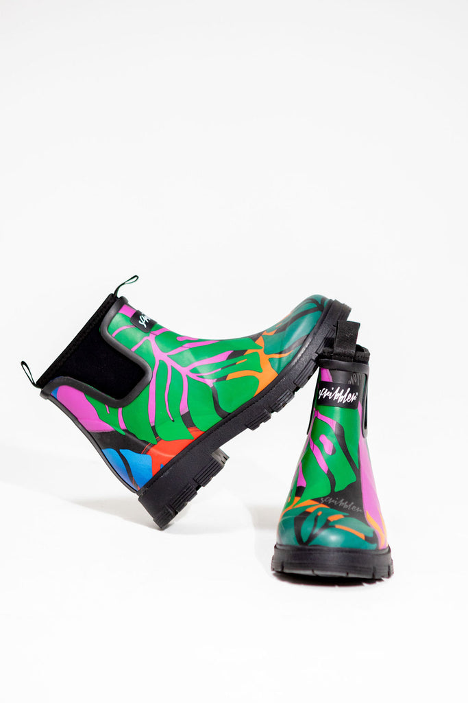Scribbler rain boots, waterproof ankle gumboots for women, rain wellies for ladies, outerwear, waterproof, natural rubber boots, lightweight, neoprene lining, sustainable fashion, winter boots, tropical Carnaval printed Chelsea boots, carnival print, camping boots, stylish boots, colourful printed boots, best ankle gum boots, NZ design, New Zealand designer, handmade, mustard yellow, pink, blue, green