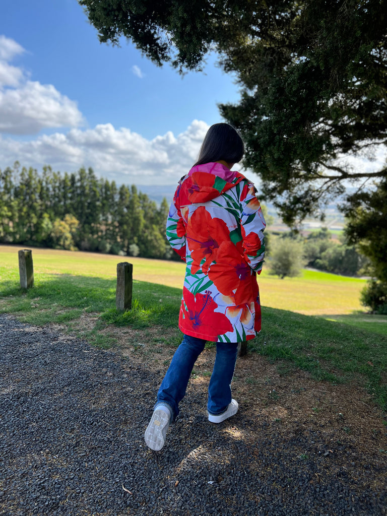 St Tropez Scribbler mesh-lined rain jacket, tropical, floral print, hibiscus flower, raincoat, colourful printed rain wear, waterproof jacket for women, lightweight, plus size raincoat, New Zealand design