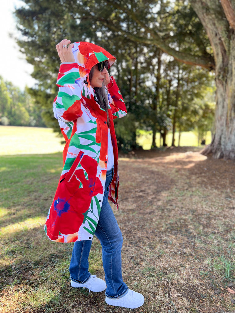 St Tropez Scribbler mesh-lined rain jacket, tropical, floral print, hibiscus flower, raincoat, colourful printed rain wear, waterproof jacket for women, lightweight, plus size raincoat, New Zealand design