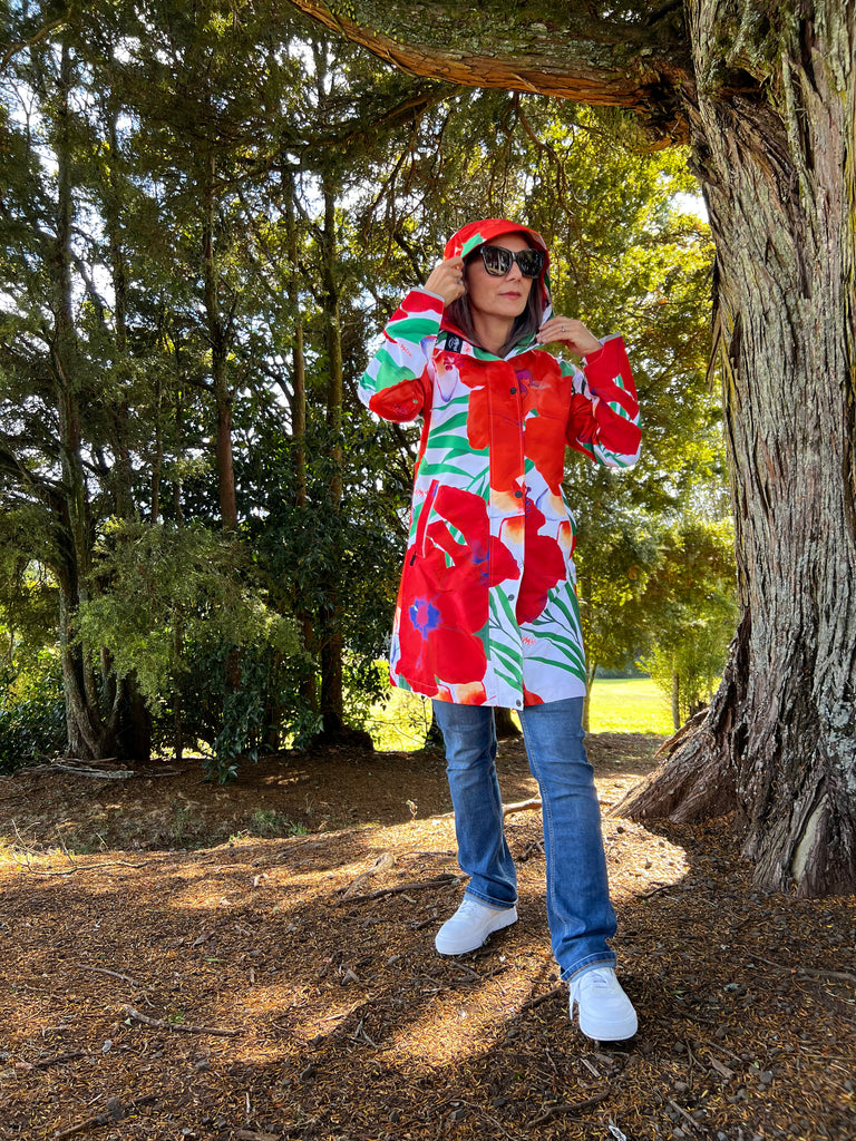 St Tropez Scribbler mesh-lined rain jacket, tropical, floral print, hibiscus flower, raincoat, colourful printed rain wear, waterproof jacket for women, lightweight, plus size raincoat, New Zealand design