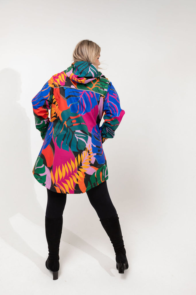 Carnaval fleece bonded womens waterproof raincoat, yellow, mustard, cobalt blue, magenta pink, plus size, NZ design, rain jacket, waterproof parka, winter coat, travel, wind proof, Scribbler, floral coat, USA winter coat, Canada waterproof winter parka, carinval print, colourful rain jacket, colourful raincoat, colourful coat, tropical