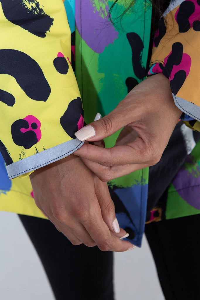 Neon Safari Scribbler mesh-lined rain jacket, animal print, raincoat, colourful printed rain wear, waterproof jacket for women, lightweight, plus size raincoat, New Zealand design