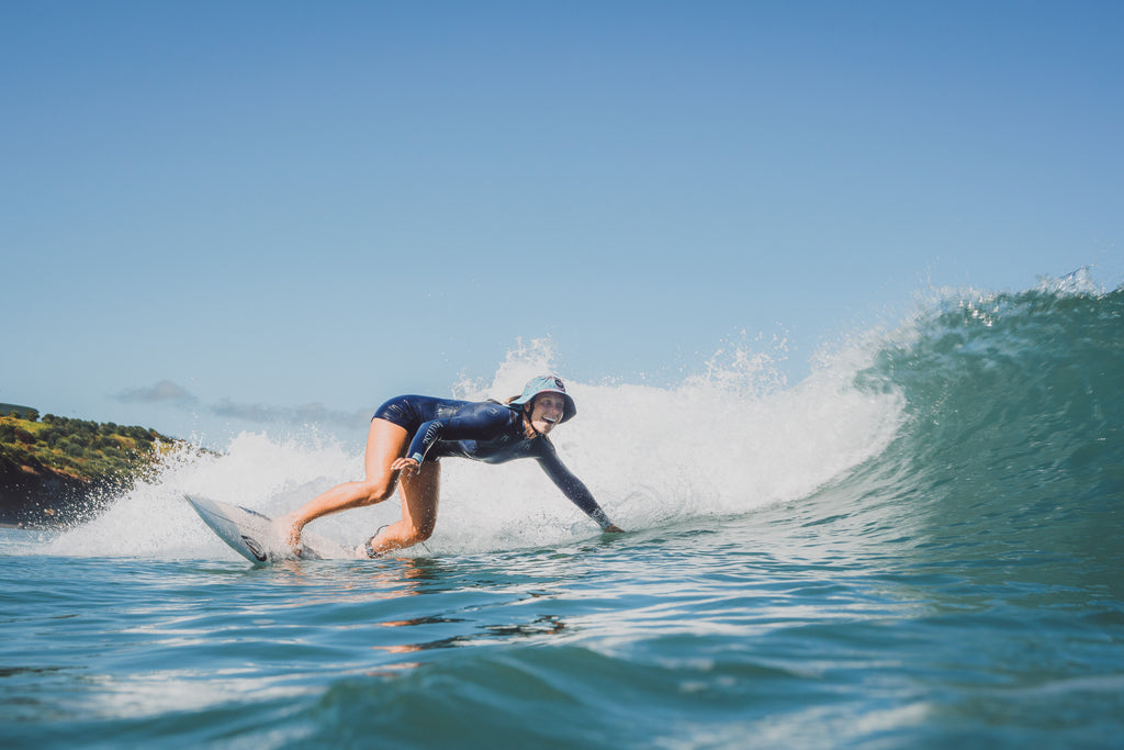 Surf hat for women, floral sun hat, water sports hat for ladies, colourful sports cap, Scribbler hat, surfing, kayaking, head wear, SUP, body boarding, sailing, fishing, sun protection, slap on a hat, sun smart, sun safe, New Zealand, kiwi, NZ, Paige Hareb