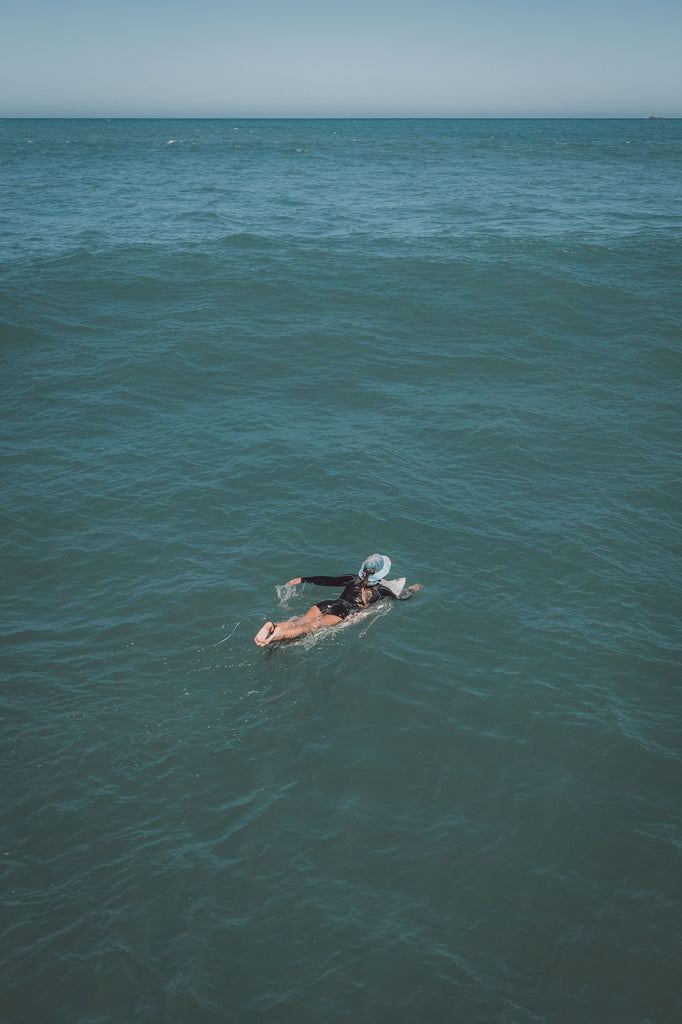 Surf hat for women, floral sun hat, water sports hat for ladies, colourful sports cap, Scribbler hat, surfing, kayaking, head wear, SUP, body boarding, sailing, fishing, sun protection, slap on a hat, sun smart, sun safe, New Zealand, kiwi, NZ, Paige Hareb