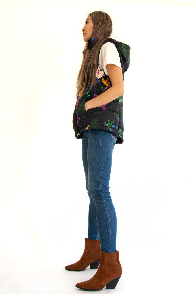 Scribbler paradiso vest, tropical print, black colourful puffer vest, waterproof gilet, recycled fabric, recycled puffer, conscious fashion, plus size vest, floral vest, removable hood, tropical print, printed vest, colourful vest, black puffer vest, quilted vest, plus size vest, NZ, New Zealand, Australia, USA