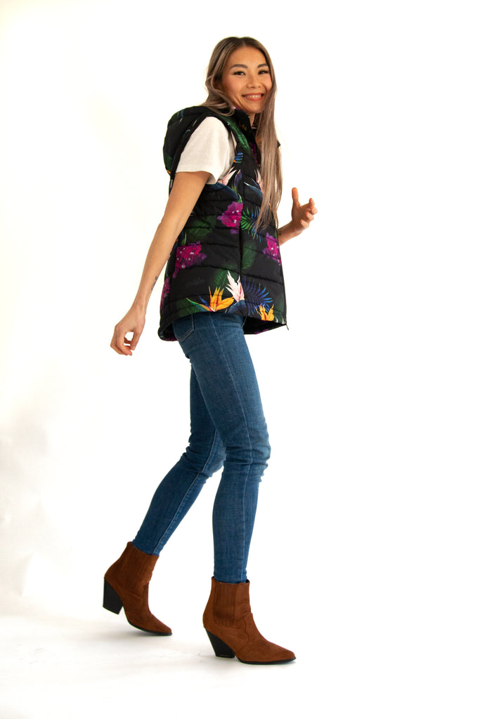 Scribbler paradiso vest, tropical print, black colourful puffer vest, waterproof gilet, recycled fabric, recycled puffer, conscious fashion, plus size vest, floral vest, removable hood, tropical print, printed vest, colourful vest, black puffer vest, quilted vest, plus size vest, NZ, New Zealand, Australia, USA