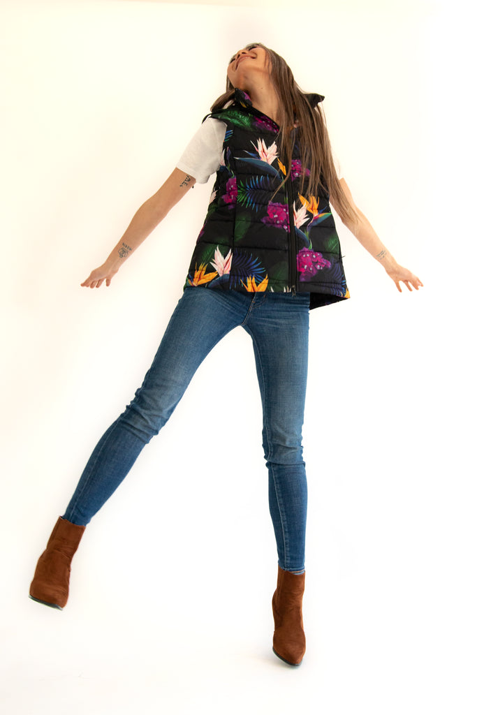 Scribbler paradiso vest, tropical print, black colourful puffer vest, waterproof gilet, recycled fabric, recycled puffer, conscious fashion, plus size vest, floral vest, removable hood, tropical print, printed vest, colourful vest, black puffer vest, quilted vest, plus size vest, NZ, New Zealand, Australia, USA